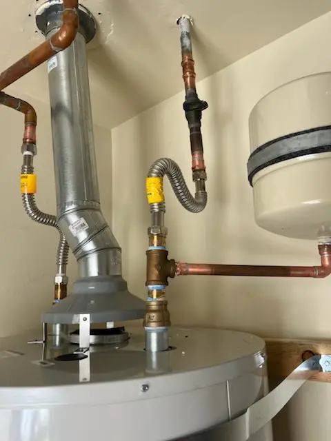 Water heater installation and plumbing repair in Maple Flats